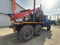 Лесовоз УРАЛ-5557 с новым манипулятором  готов к работе