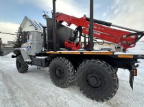 Лесовоз УРАЛ-5557 с новым манипулятором Палфингер 2026 — готов к работе