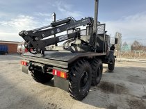 Лесовоз УРАЛ-5557 с новым манипулятором Майман 2026 — готов к работе