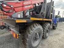 Лесовоз УРАЛ-5557 с новым манипулятором  готов к работе